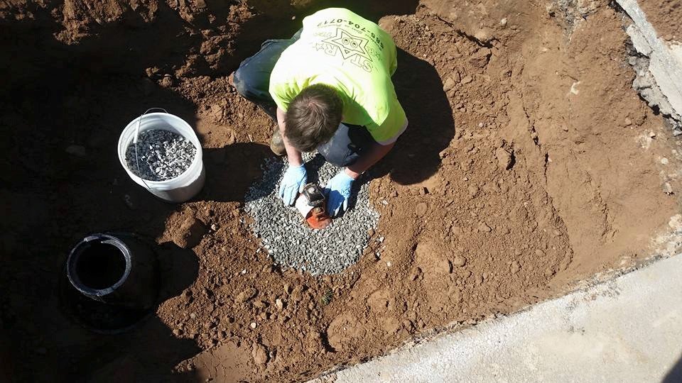 Star Rooter technician installing a new water service connection